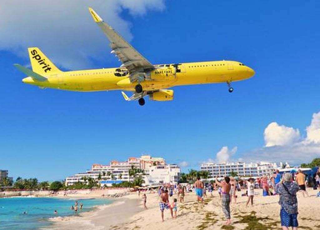 A plane landing in St, Maarten.