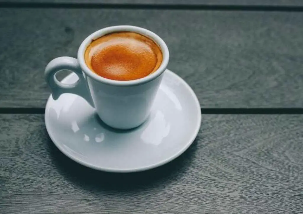 An espresso coffee on a table.