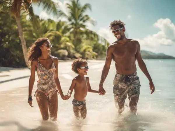 A family enjoying themselves in the water on their Caribbean vacation.