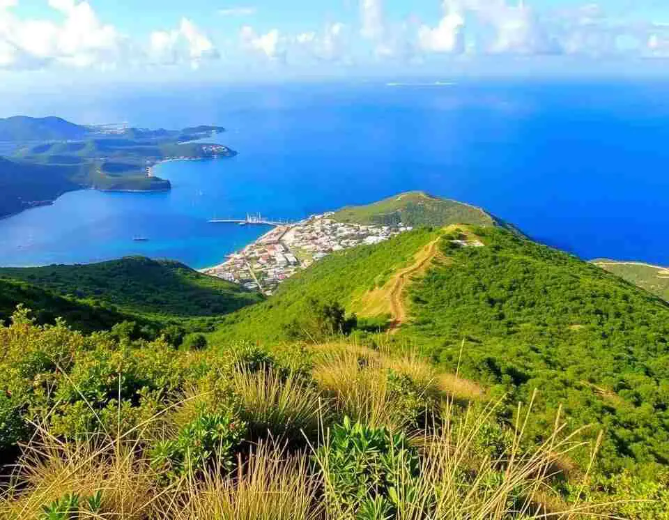 panoramic views of St. Maarten’s coastline and the Caribbean Sea.